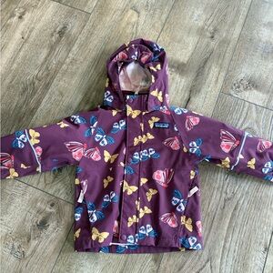 Patagonia Purple Raincoat Vibrant Floral Design